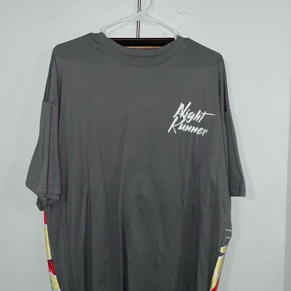 Grey t-shirt, design in the back
